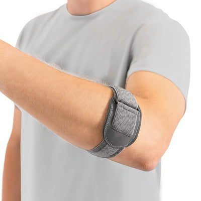 The BraceAbility elbow tendon strap applies compression to reduce tennis elbow pain