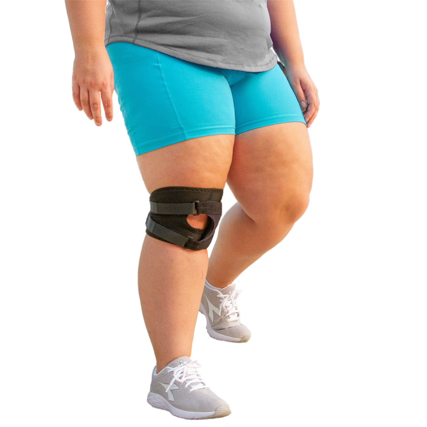 The plus size short patella tracking knee brace stays in place while walking and running  hide_on_site