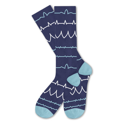 our knee high blue compression socks are sock as a pair with a fun pattern