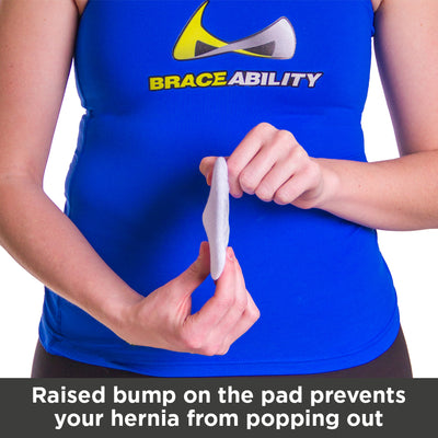 Raised bump on the pad prevents your hernia from popping out