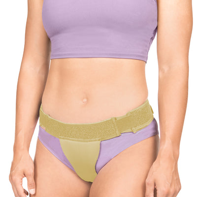 The tan BraceAbility Pelvic Pro works to keep prolapsed pelvic organs in the proper position
